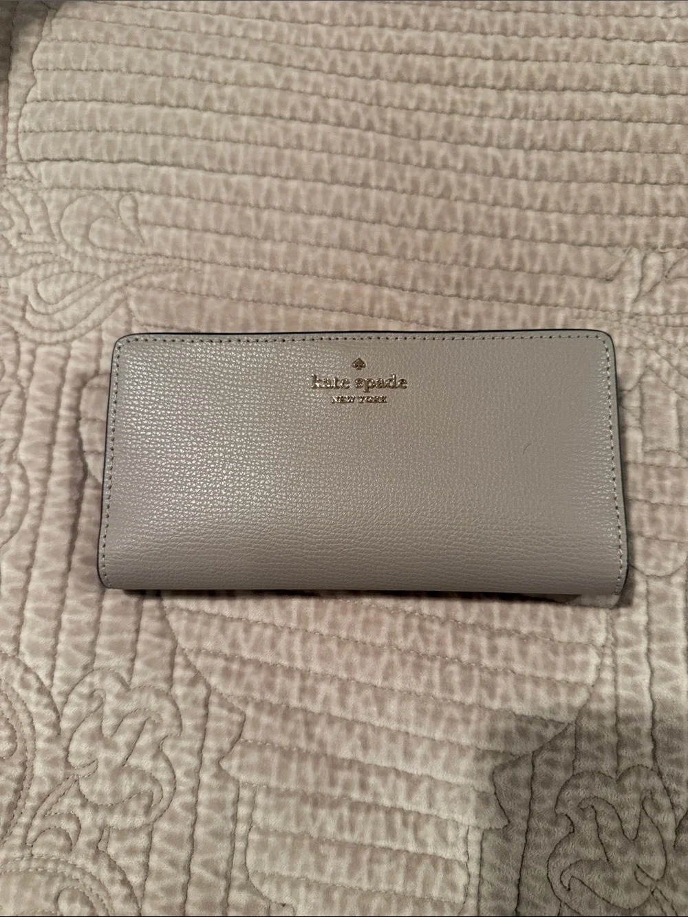kate spade Pebbled Leather Long Wallet in Light Gray with Gold Logo